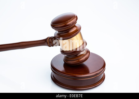 Judge's hammer (Gavel) on white background. Symbolic photo for justice, Richterhammer (Gavel) auf weissem Hintergrund. Symbolfot Stock Photo