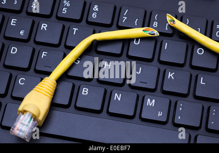 Keyboard and cable Stock Photo
