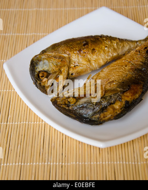 fried Mackerel fish on dish for healthy food Stock Photo