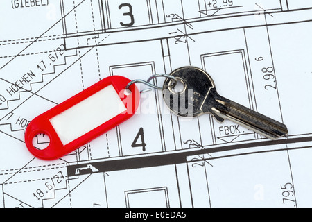 An architect's plan of an architect with a pocket calculator. Symbolic photo for financing and planning of a new house., Ein Bau Stock Photo