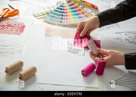 fashion designers, working in progress on tailor table Stock Photo