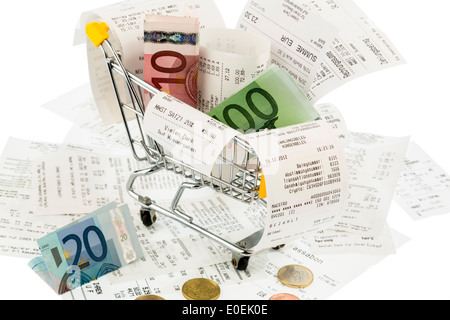 Shopping carts, bank notes and receipts, symbolic photo for buying power, consumption and inflation, Einkaufswagen, Geldscheine Stock Photo