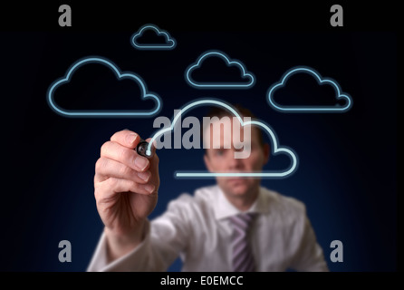 A businessman drawing a cloud storage concept on a clear screen. Stock Photo