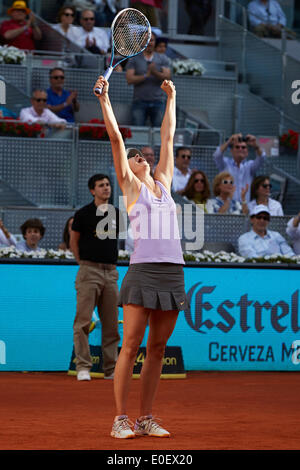 Madrid, Spain. 11th May, 2014. Maria Sharapova of Russia celebrates after her victory over Simona Halep of Romania in the WTA final of the Mutua Madrid Open 2014 from La Caja Magica. Credit:  Action Plus Sports/Alamy Live News Stock Photo