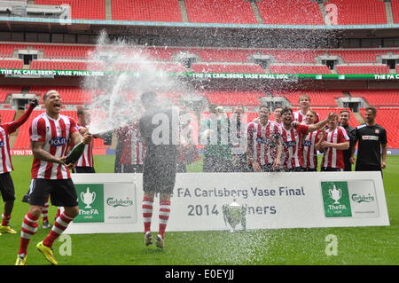 London, UK. 10th May, 2014. Sholing Town FC players and fans celebrate winning the 2014 FA Vase at Wembley, London, UK.  Sholing Town FC are based in Hampshire and are this year's Champions of the Wessex Premier League played West Auckland Town FC who are based in County Durham and finished 5th in the second oldest football league in the world, in an absorbing final, with Sholing Town FC taking the honour of  lifting the FA Vase at Wembley. Credit:  Flashspix/Alamy Live News Stock Photo