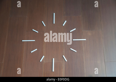 clock without numbers on the wall Stock Photo