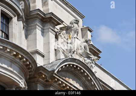 Stone statues on the Old War office building in Whitehall, London, United Kingdom. Stock Photo