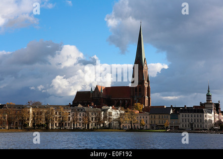 View across Pfaffenteich Lake to Schwerin Cathedral, Schwerin, Mecklenburg-Western Pomerania, Germany Stock Photo