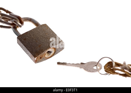 A padlock and a key, isolated on white. Stock Photo