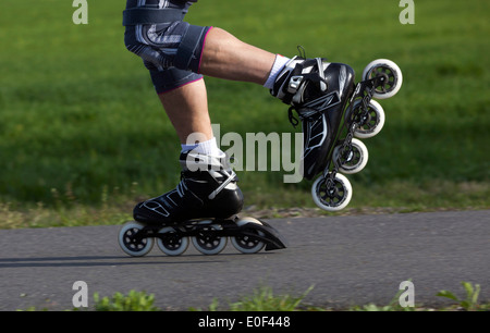 rollerblades roller skating on trail, inline skates Stock Photo