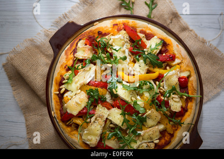 Homemade Vegetarian Pizza with Peppers, Brie & Rocket Stock Photo