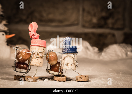Concept two men harvesting grapes, wine cork figures Stock Photo