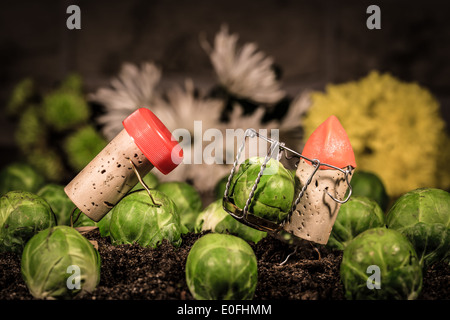 Concept Farmer works on the field, wine cork figures Stock Photo