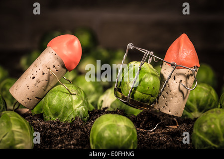 Concept Farmer on the field with scrouts, wine cork figures Stock Photo