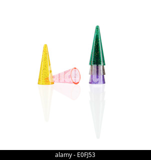 Different colored pawns isolated on a white background Stock Photo