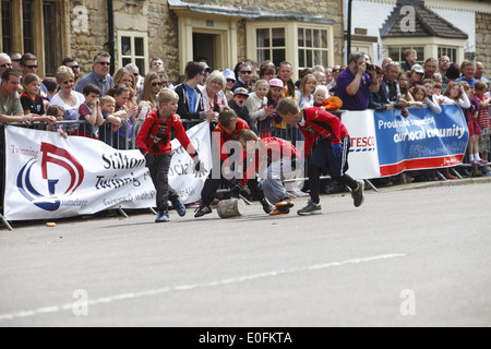 The quirky annual cheese rolling held in Stilton on May Day Bank Holiday Monday, in Stilton, Cambridgeshire, England, Britain Stock Photo