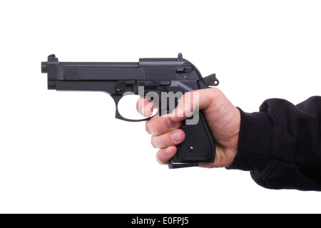 Pistol in hand, isolated on white background Stock Photo