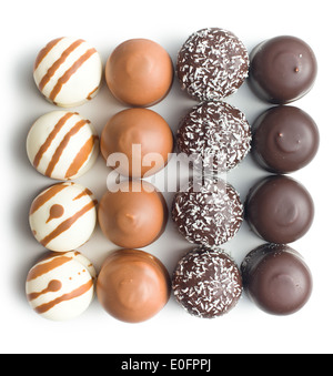 chocolate covered marshmallows on white background Stock Photo