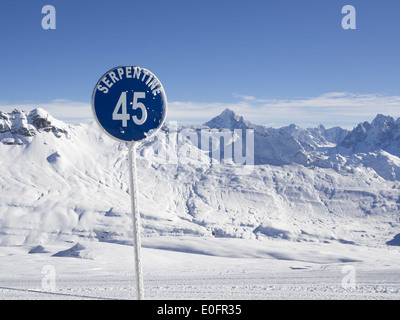 View from blue run Serpentine on Les Grandes Platieres in Le Grand Massif ski area with view to mountains in French Alps. France Stock Photo