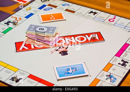 A game of Monopoly in progress Stock Photo
