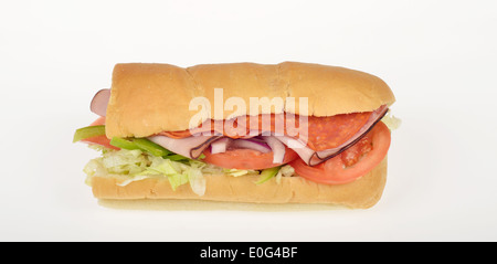 Subway BMT submarine sandwich on an italian bread roll with tomatoes, lettuce, red onions, salami, ham on white background, cutout. USA Stock Photo