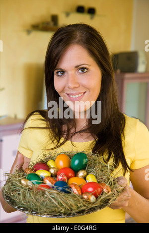 Woman with Easter nest , Frau mit Osternest Stock Photo