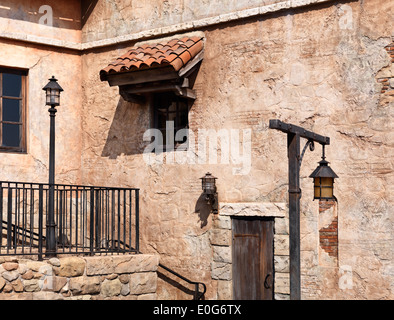 Old rustic house wall with windows architecture in Venetian style Stock Photo