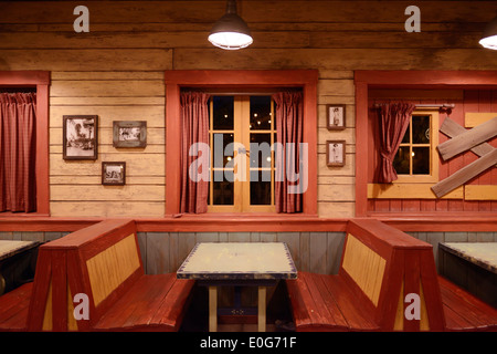 Table and benches at a Mexican restaurant in Tokyo Disneysea, Japan. Stock Photo