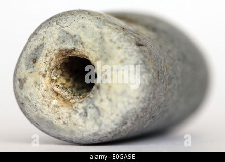 eroded flint pebbles known in Suffolk as hag stones or adder stones Stock Photo
