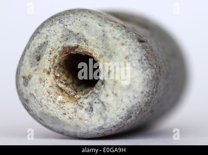 eroded flint pebble known in Suffolk as hag stones or adder stones Stock Photo