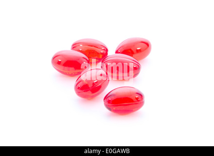group of red pills isolated on white background Stock Photo