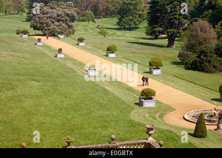 Visitors wandering around the gardens at Osborne House, East Cowes, Isle of Wight, Hampshire UK in May - Osbourne House Stock Photo