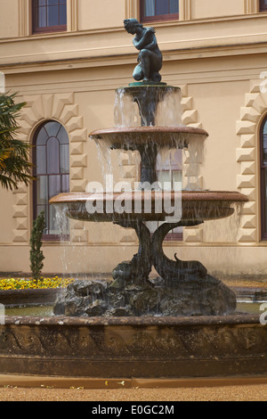 water flowing over fountain in gardens of Osborne House, East Cowes, Isle of Wight, Hampshire UK in May - Osbourne House Stock Photo