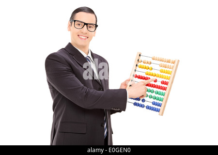 Businessman moving the units of an abacus Stock Photo