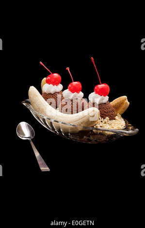 Banana Split Ice Cream isolated over black background Stock Photo