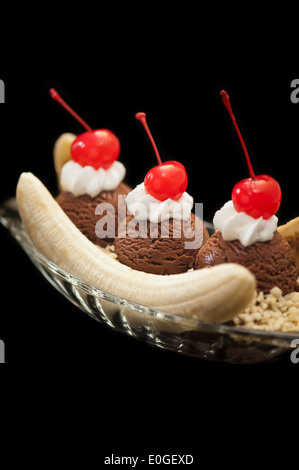 Banana Split Ice Cream isolated over black background Stock Photo