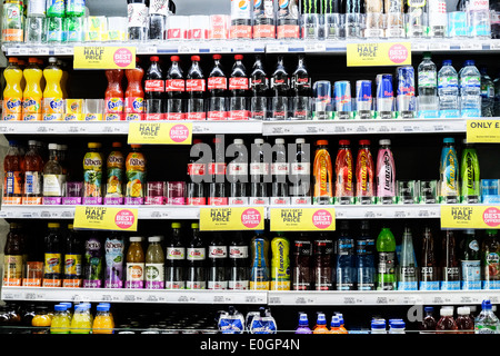 Bottles of sugary soft drinks on sale.