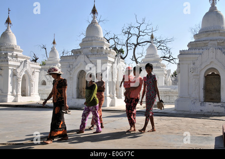 Woman with a child, Kuthodaw Pagoda, Mandalay, Myanmar, Burma, Asia Stock Photo