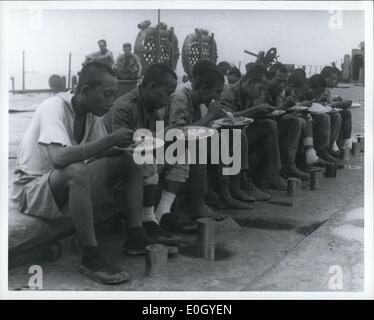 Jan 1, 1940 - Japanese prisoners eat a meal on a US warship during WWII in the Pacific. (exact date unknown) Stock Photo