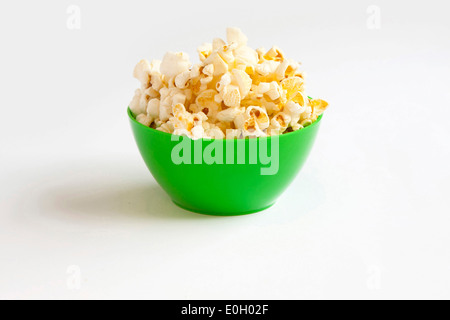 Popcorn in green bowl Stock Photo