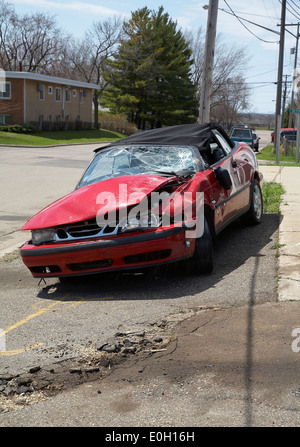 A smashed up Saab cabriolet that has been in an accident in Minneapolis, Minnesota, USA Stock Photo