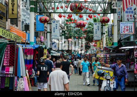 Visitors wandering along Petaling Street in Kuala Lumpar Stock Photo