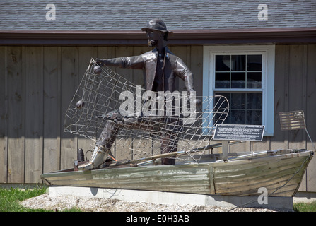 Metal sculpture of fisherman at Rogers Street Fishing Village Museum and Great Lakes Coast Guard Museum, Two Rivers, Wisconsin Stock Photo