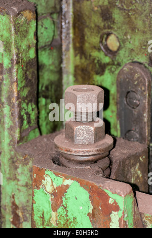 Old metal construction bonded bolts and nut Stock Photo