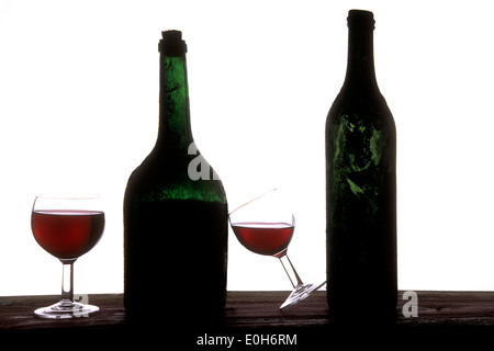 Red wine bottles and glasses Stock Photo