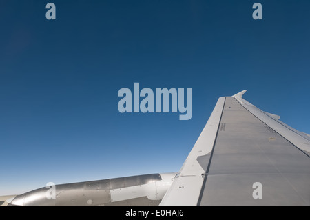 looking through a window of a big jet plane Stock Photo