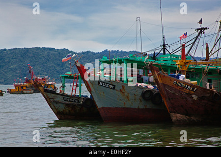 FISHING BOATS at anchor in KUCHING HARBOUR - SABAH, BORNEO, MALAYSIA Stock Photo