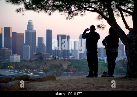 Couple viewing the Downtown Los Angeles Skyline from Elysian Park Stock Photo