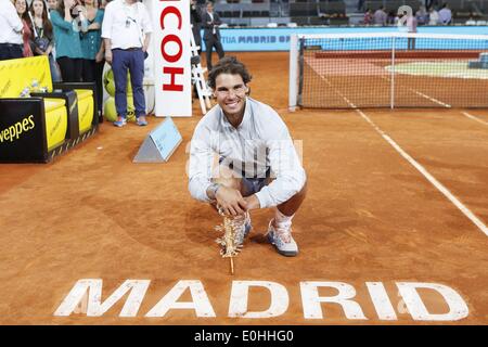 Madrid, Spain, May 11, 2014. 11th May, 2014. Rafael Nadal (ESP) Tennis : Winner Rafael Nadal of Spain celebrates with trophy after the men's singles final match of the Mutua Madrid Open tennis tournament at the La Caja Magica in Madrid, Spain, May 11, 2014 . © AFLO/Alamy Live News Stock Photo