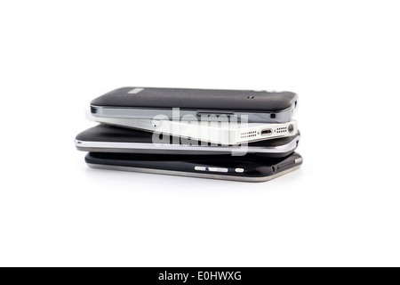 Stack of different smartphones Stock Photo
